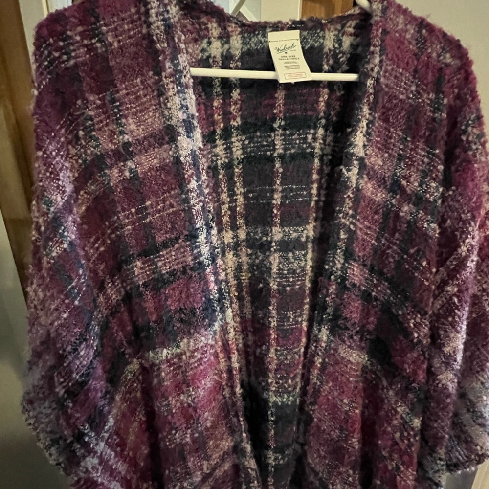 Purple poncho.